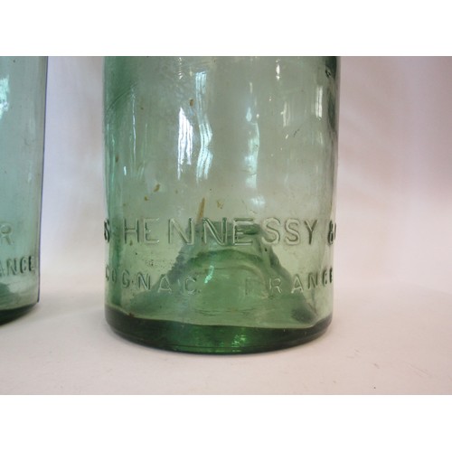 1061 - Two large French green glass bottles, one 