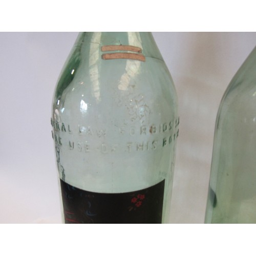 1061 - Two large French green glass bottles, one 