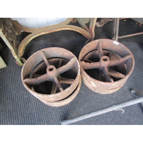 5015 - Four cast iron implement wheels, 37cm diameter