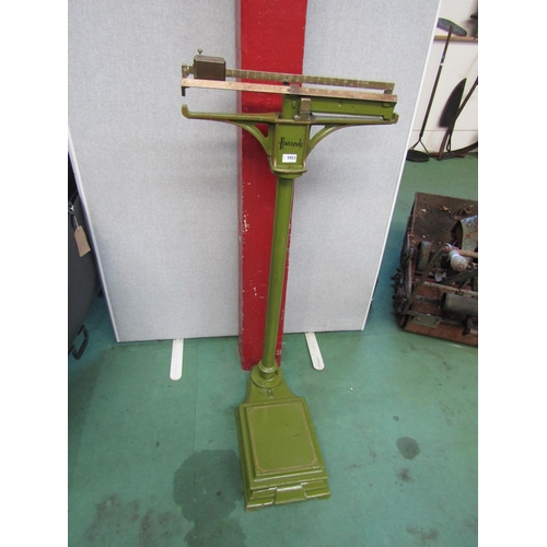 5053 - A set of green painted iron and brass weighing scales wtih Harrods transfer   (E)  £20-40