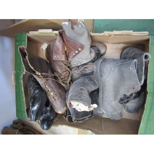 5059 - A box of mixed boots and ice skates