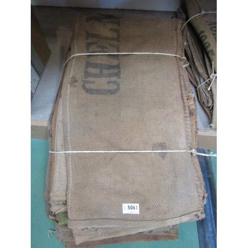 5061 - Eight hessian corn sacks