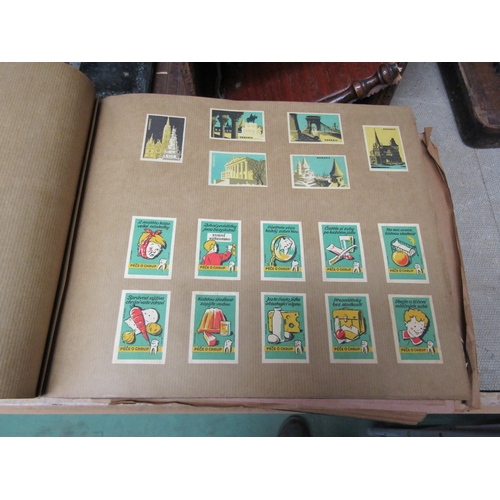 5127 - Three albums of match box covers to include early 20thc examples, Japanese, Russian and Continental ... 