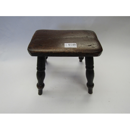 5149 - A rustic four legged stool