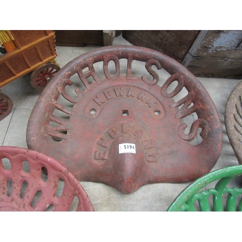 5194 - An iron Nicholson implement seat