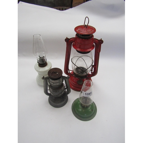 5287 - Four assorted oil lamps