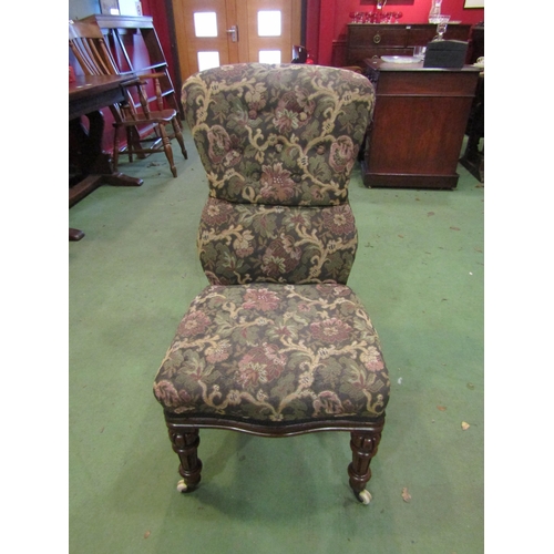 4021 - A Circa 1850 walnut button back tapestry upholstered armchair the serpentine front seat over melon f... 