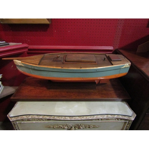 4086 - A vintage handmade pond yacht hull on later stand, 20cm tall x 66cm long   (R) £30