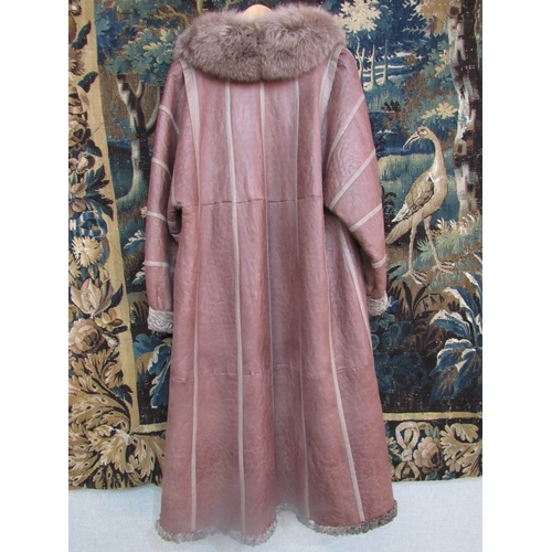 4178 - A superb modern buff leather Persian lamb lined ladies 3/4 length coat, the coat has all over stitch... 