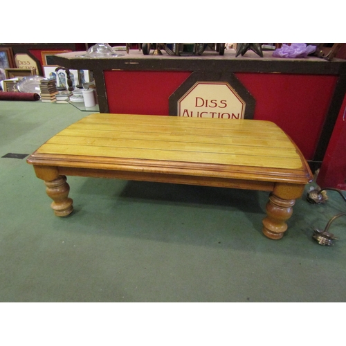 4016 - A modern Eastern coffee table on turned legs, 38cm tall x 130cm long x 75cm wide               (E) £... 