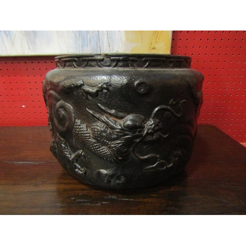 4029 - A Clanta, England, jardiniere with dragon relief, numbered 2006K to base, 20cm tall x 26cm diameter