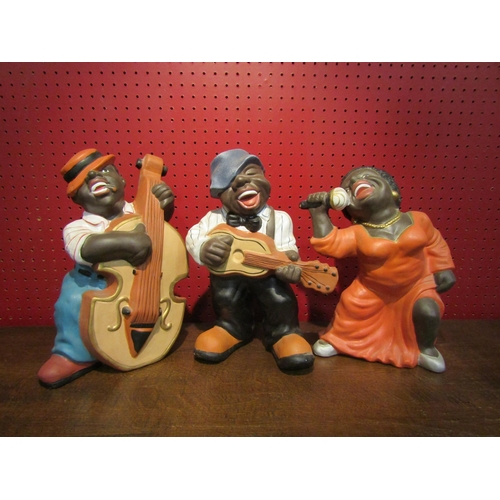 4043 - A group of three ceramic musician figures, approximately 30cm tall