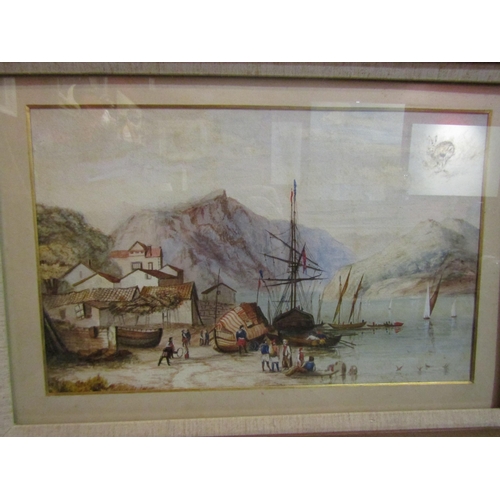 4051 - A watercolour depicting a shoreline with boats, figures and houses, framed and glazed, 26cm x 39cm i... 