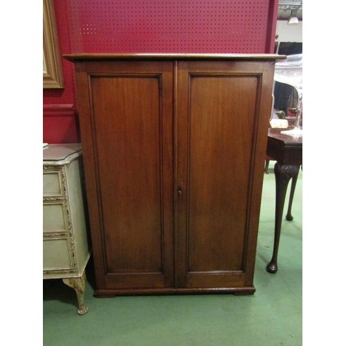 4057 - A mid Victorian mahogany two door linen cupboard with working lock and key, 108cm tall x 82cm wide