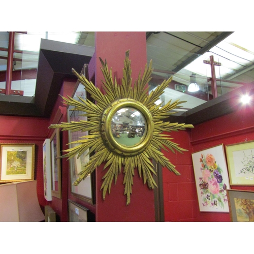 4058 - A gilt framed sunburst form convex mirror, mirror plate 11.5cm diameter