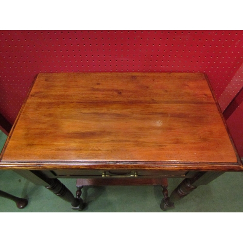 4070 - A mahogany hall table with single drawer on turned supports to stretcher base, 80cm tall x 61cm wide... 