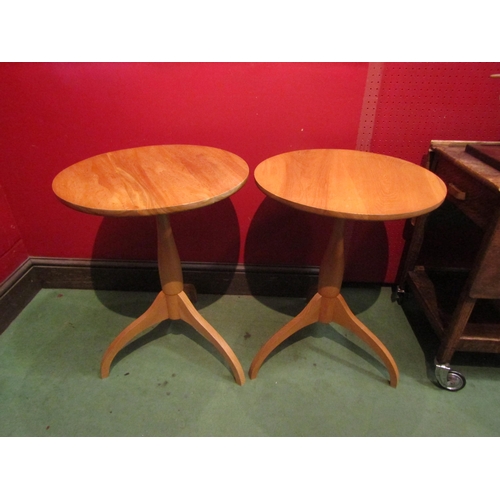 4081 - A pair of modern tripod wine tables, 62cm tall x 46cm diameter