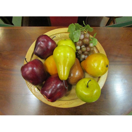 4089 - An olive ash turned bowl (30cm diameter) containing faux fruit  (R) £15