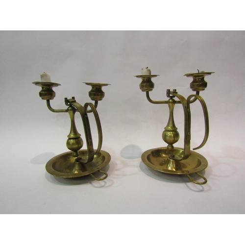 4094 - A pair of brass Patagonian Express gimbaled candlesticks (stamped Far-metal Chile)