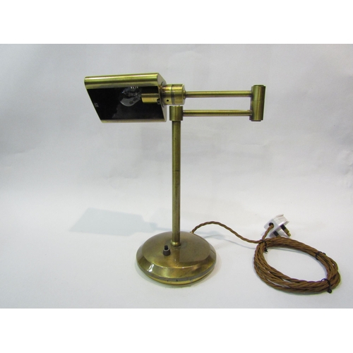 4096 - A brass swing arm desk lamp