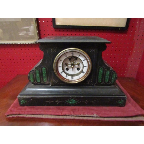 4105 - A black slate mantel clock of architectural form with pendulum, 22cm tall x 36cm wide x 16cm deep