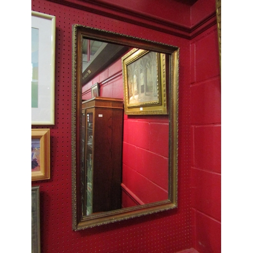 4110 - A rectangular gilt mirror 82cm x 52cm