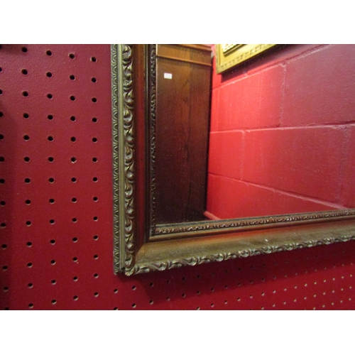 4110 - A rectangular gilt mirror 82cm x 52cm