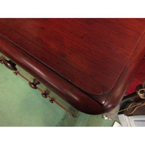 4139 - A mid Victorian walnut round corner chest of two short over three graduating long drawers with turne... 