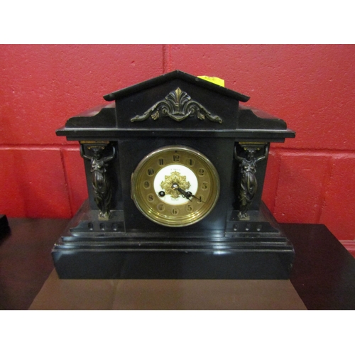 4153 - A late Victorian black slate mantel clock of architectural form, central gilt dial marked Bullen Nor... 