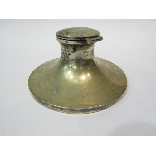 4296 - A silver capstan inkwell, marks rubbed, approximately 12cm diameter