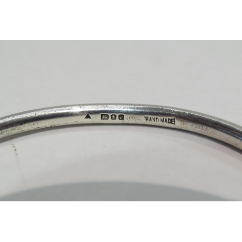 4363 - A silver bangle, 26.7g