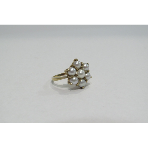 4374 - A 9ct ring wih pearls in floral setting, approximately 3.8g