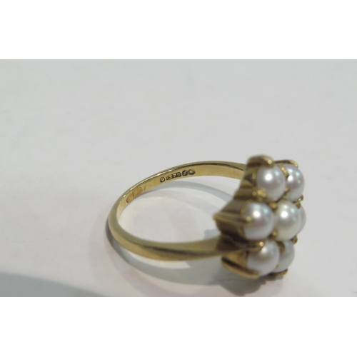 4374 - A 9ct ring wih pearls in floral setting, approximately 3.8g