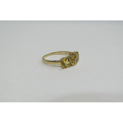 4384 - A 9ct three stone citrine set ring, size N/O,  approximately 2g