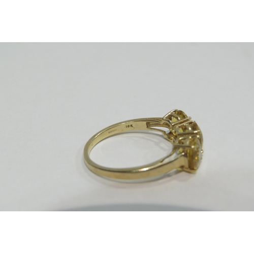 4384 - A 9ct three stone citrine set ring, size N/O,  approximately 2g