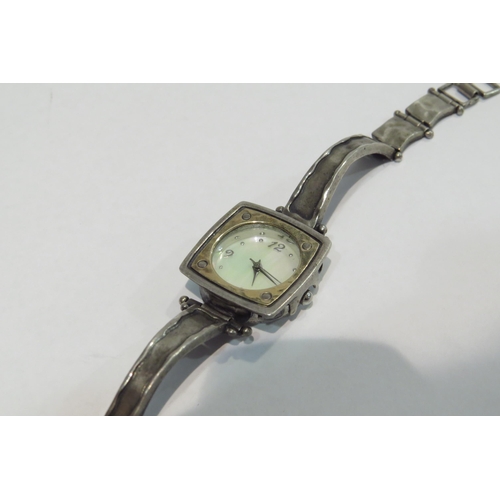 4386 - A two-tone silver lady's wristwatch with mother-of-pearl dial     (C)