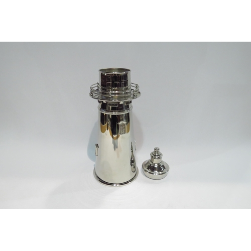 4396 - A silver plated vintage cocktail shaker in the form of  a lighthouse, marks to base, with dust cover... 