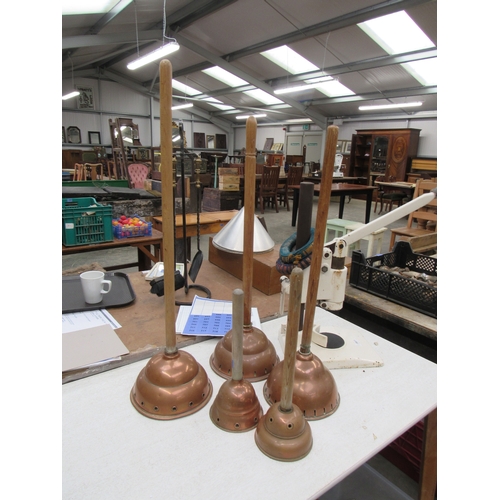 2119 - Five copper washing dollies of various sizes