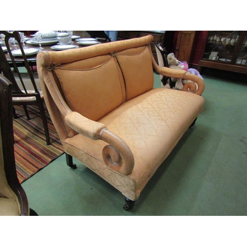 4156 - A 19th Century Irish two seater sofa with scroll arms over ring turned fore legs and ceramic castors