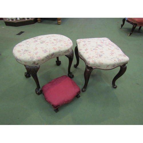 4168 - A pair of matching upholstery stools with cabriole legs and a red footstool (3)