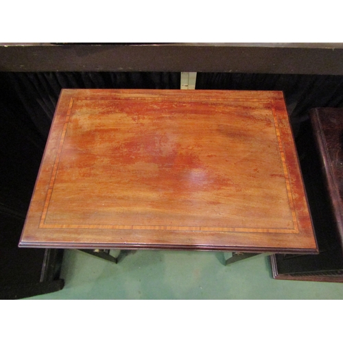 4183 - An Edwardian Arts & Crafts crossbanded mahogany work table, the single drawer and wool bag over squa... 