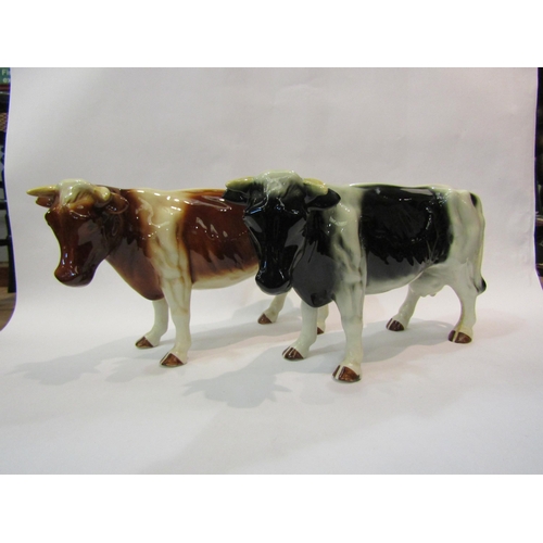 4191 - A ceramic Friesian Cow and ceramic Hereford Cow (2)