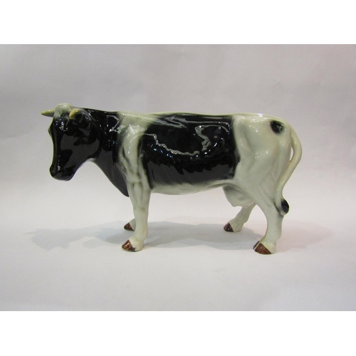 4191 - A ceramic Friesian Cow and ceramic Hereford Cow (2)