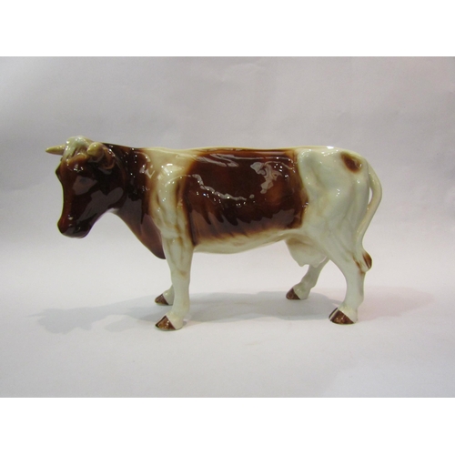 4191 - A ceramic Friesian Cow and ceramic Hereford Cow (2)