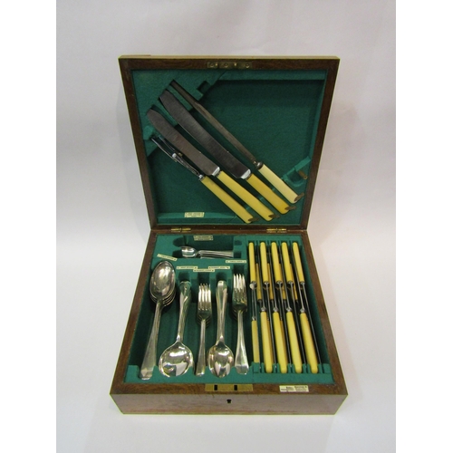 4203 - An oak cased part canteen of Walker & Hall cutlery