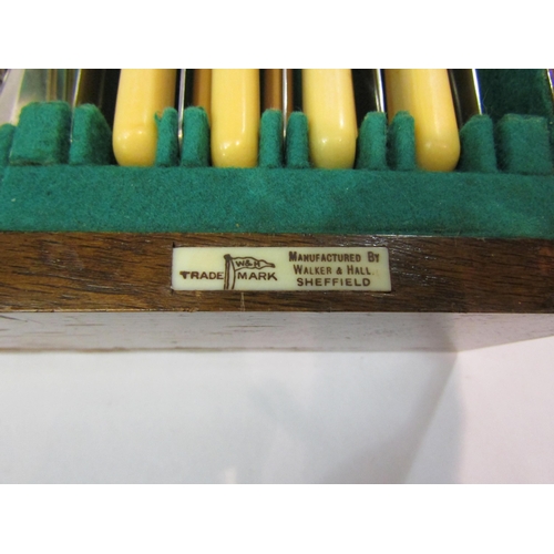 4203 - An oak cased part canteen of Walker & Hall cutlery