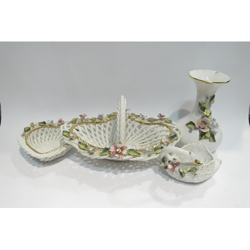 4405 - Four pieces of Continental ceramics including baskets and vases with applied floral design, a/f