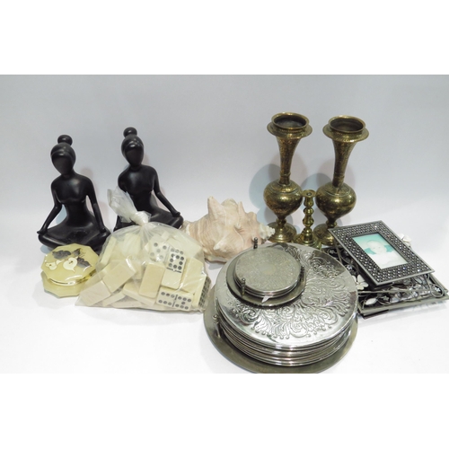 4412 - A box of assorted items including a pair of ebonised seated figures, pair of brass vases, photograph... 