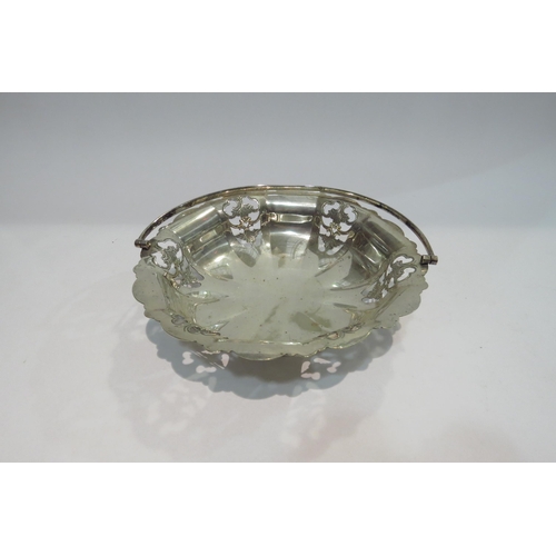 4425 - A Mappin & Webb EPNS cake basket with overhead swing handle, 23cm long