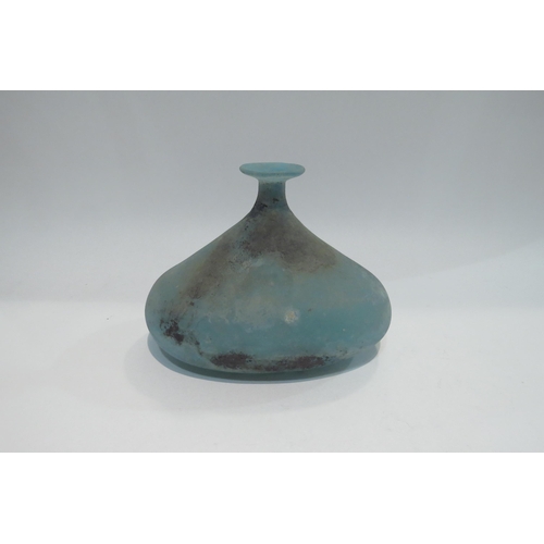 4444 - A squat form blue glass vase, 16cm height